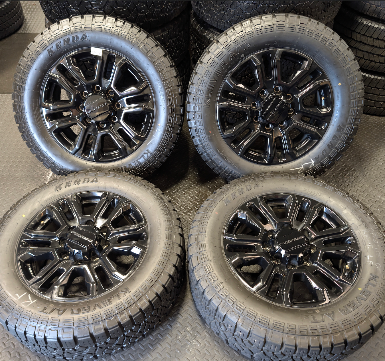 OEM 20” GMC Sierra Denali Black Wheels wrapped in Kenda Klever A/T tires.