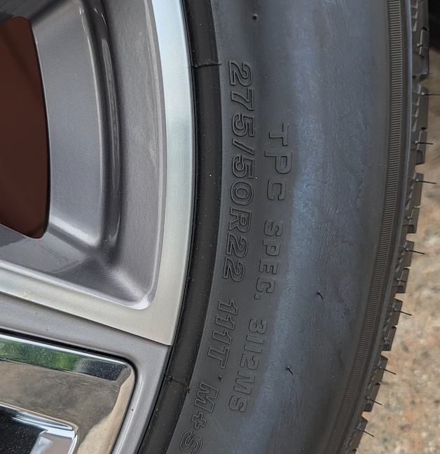 Machined Chevrolet Silverado 1500 High Country OEM 22” Wrapped in Bridgestone Alenza 275/50R22