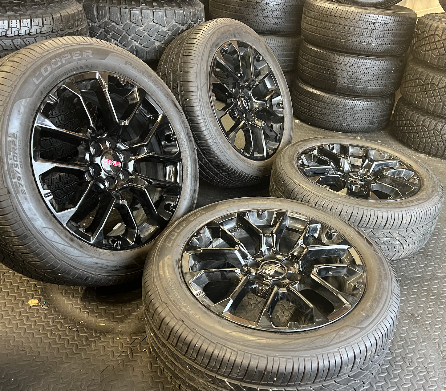 OEM 22” Gloss Black Chevrolet Wheels wrapped in Cooper ProControl tires.