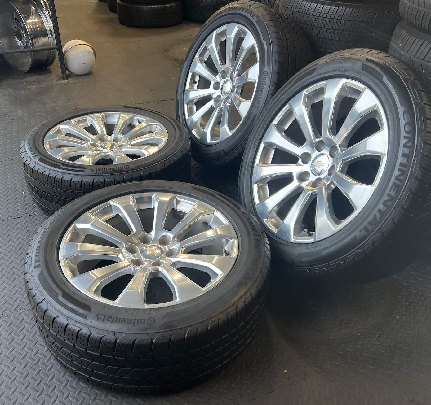 OEM 22”  High Country Polished Aluminum Wheels wrapped in Continental TerrainContact tires.