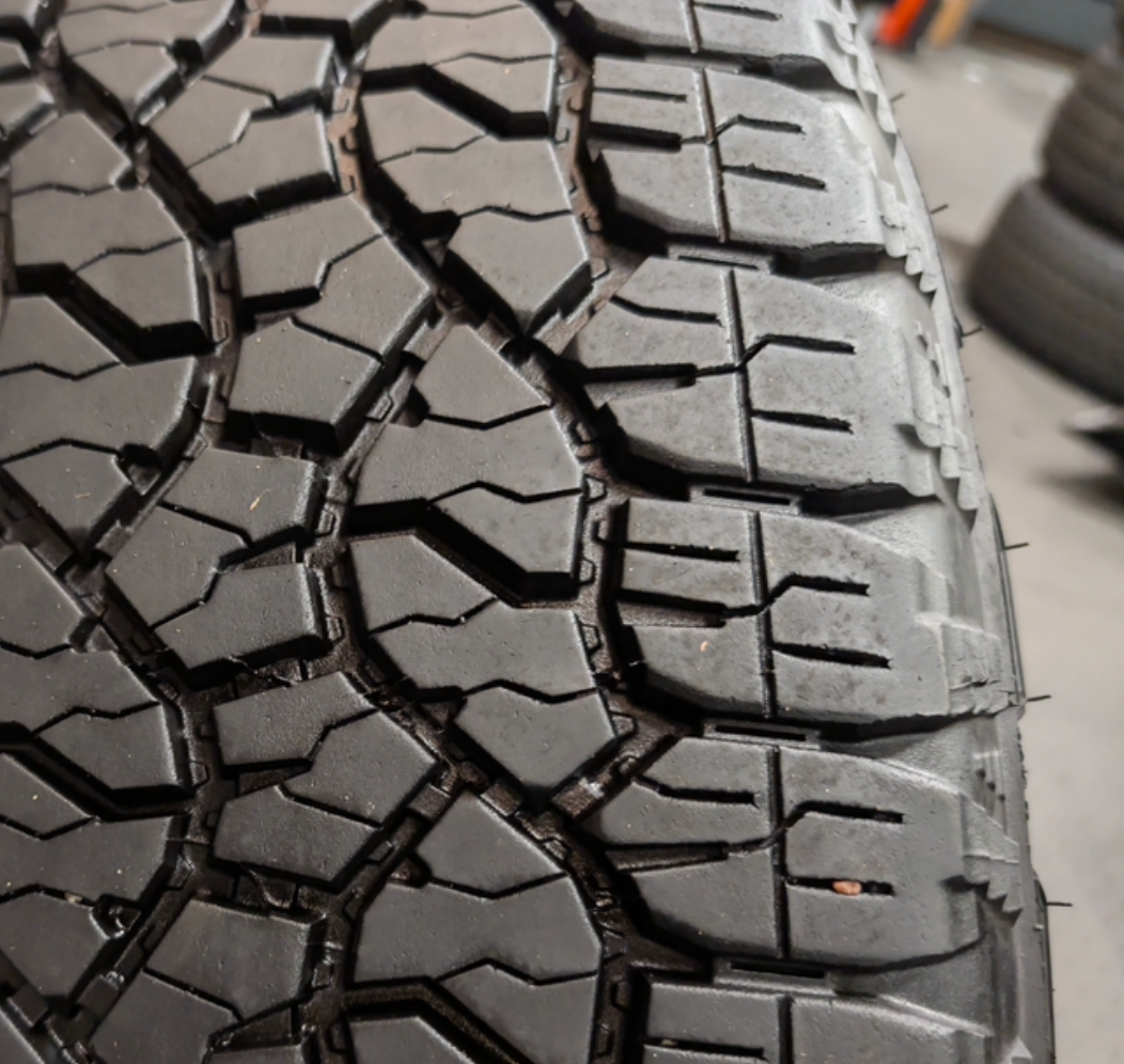 Polished Chevrolet Silverado 2500HD / 3500HD LTZ OEM 20” Wrapped in Goodyear Wrangler TrailRunner A/T LT275/65R20