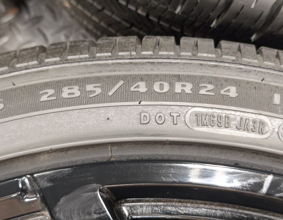 Gloss Black Ford Expedition / F-150 OEM 24” Wrapped in Goodyear Eagle Touring 285/40R24