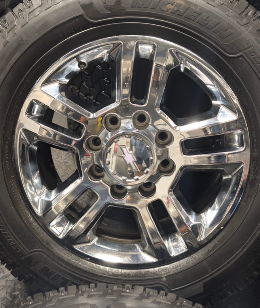 Chrome GM 2500HD / 3500HD OEM 20” Wrapped in Michelin Defender LTX
