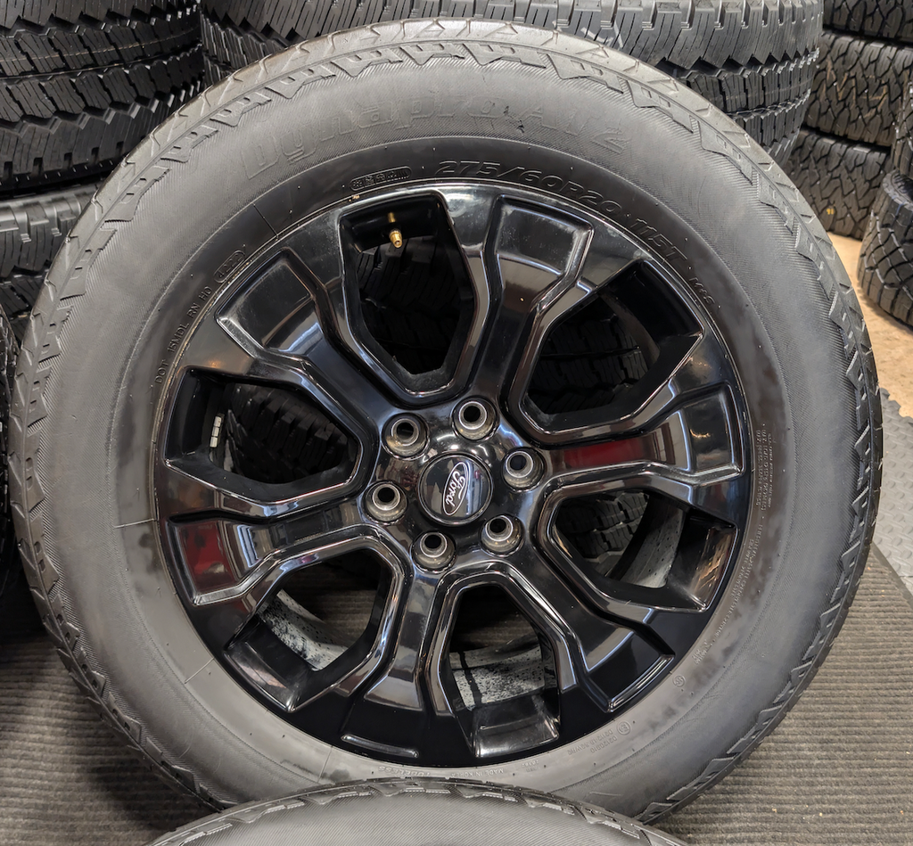 Gloss Black Ford F-150 OEM 20” Wrapped in Hankook Dynapro AT2 275/60R20