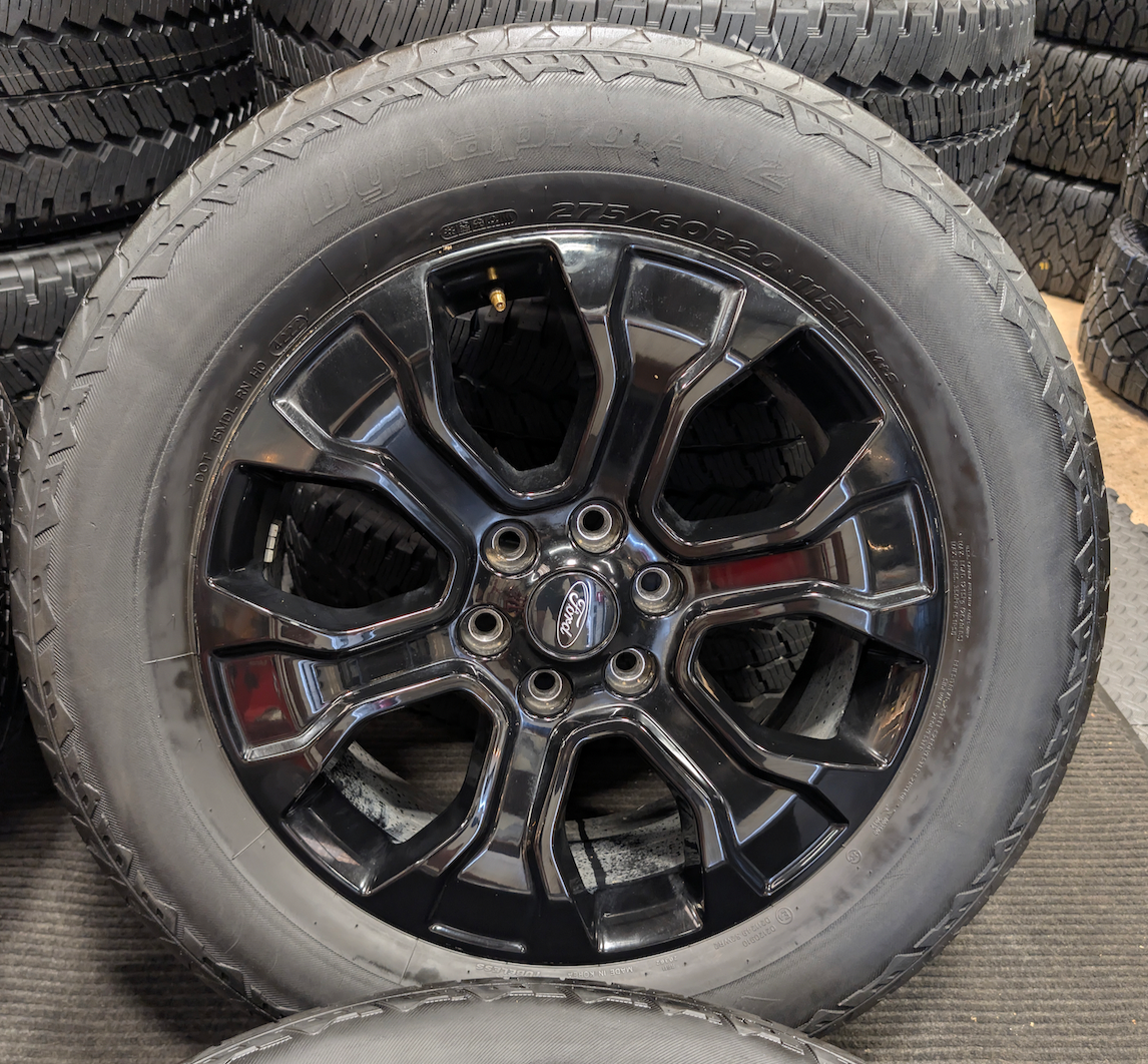 Gloss Black Ford F-150 OEM 20” Wrapped in Hankook Dynapro AT2 275/60R20