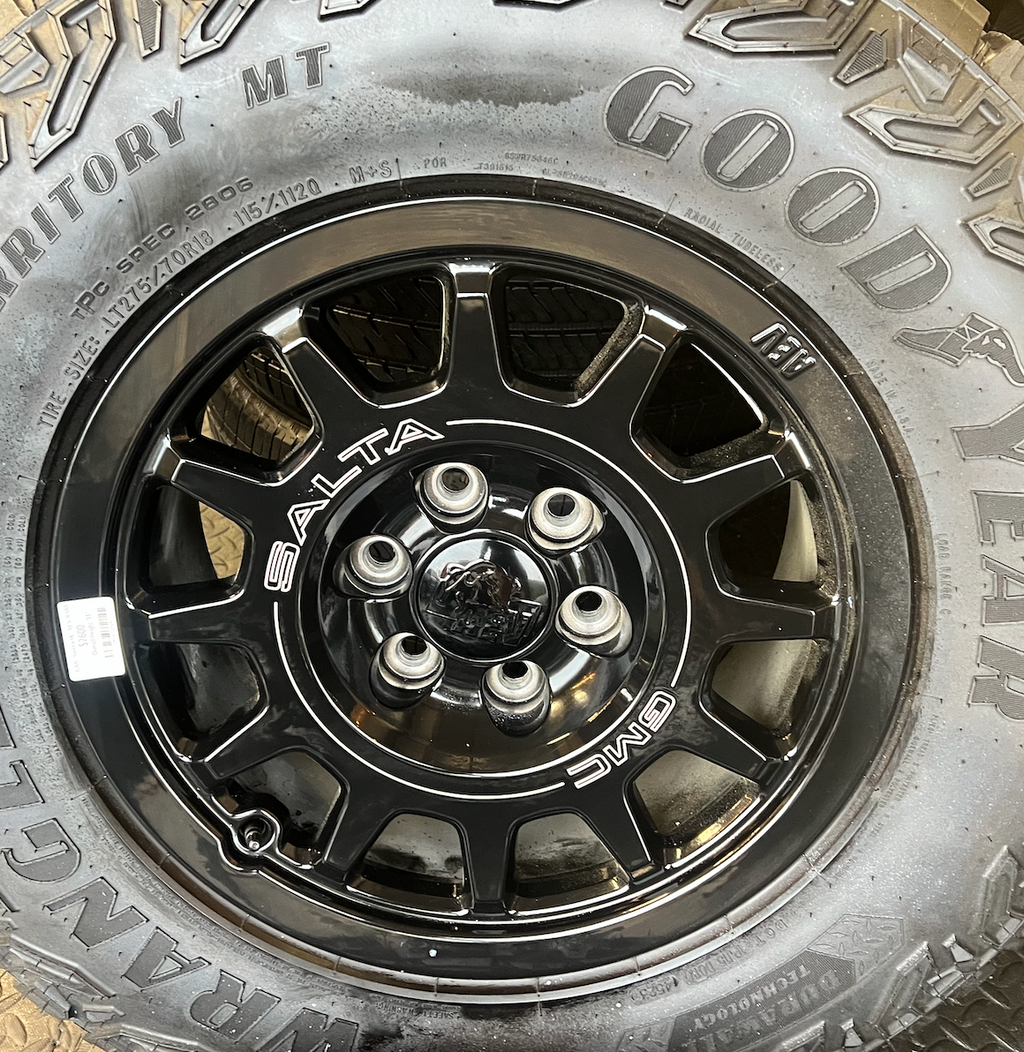 OEM 18” Wheels wrapped in Goodyear Wrangler Territory M/T tires.