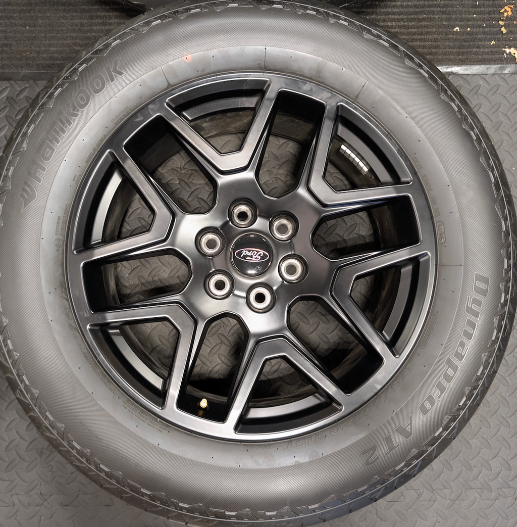 Gloss Black Ford F-150 OEM 20” Wrapped in Hankook Dynapro AT2 275/60R20