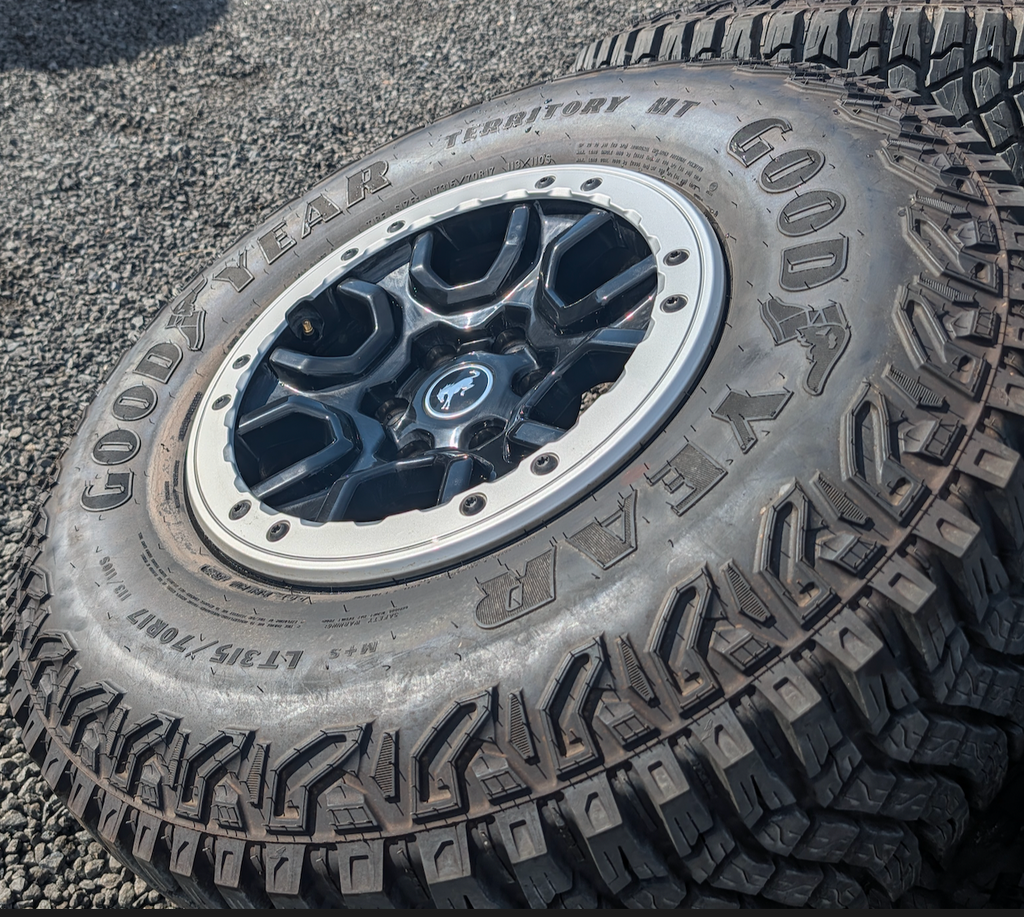 Machined Ford Bronco Sasquatch OEM 17” Wrapped in Goodyear Wrangler Territory M/T LT315/70R17
