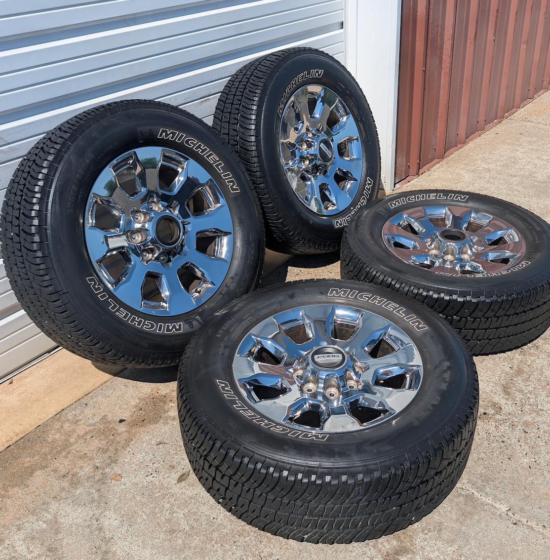 OEM 20” Chrome Ford F-250 King Ranch Wheels wrapped in Michelin LTX A/T2 tires.