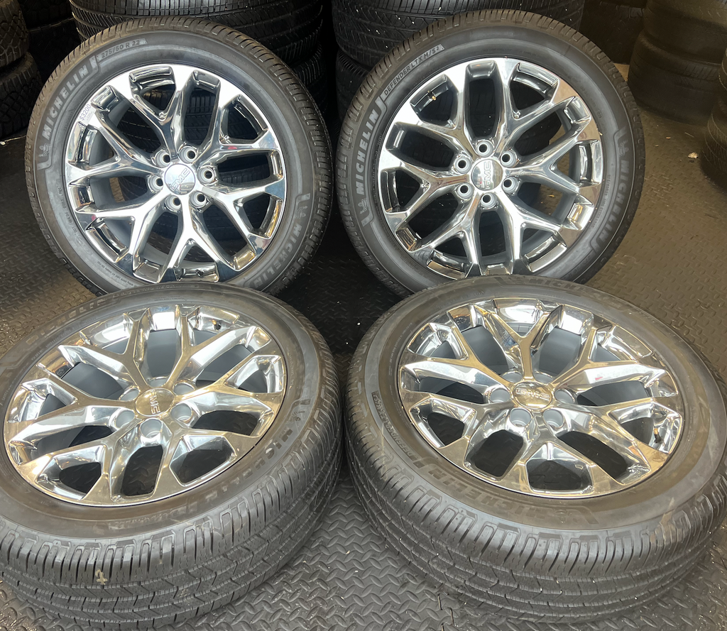 OEM 22” Polished 6-Split-Spoke Wheels wrapped in Bridgestone tires.