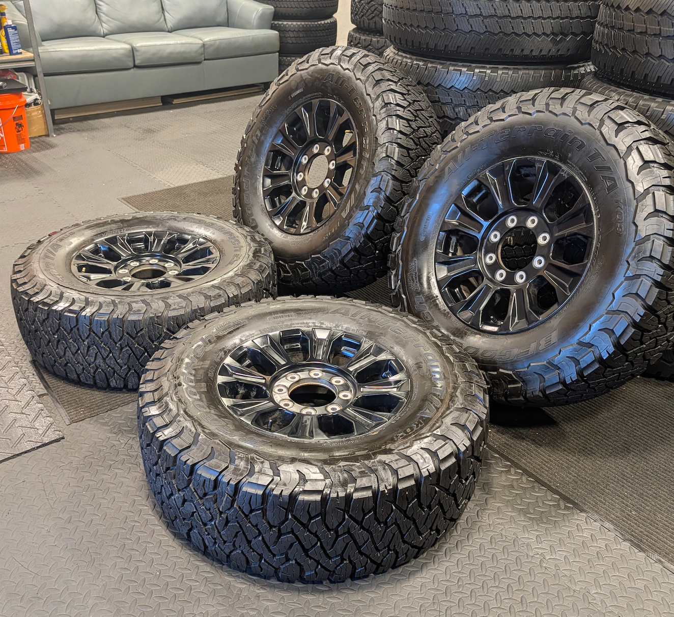 OEM 18” Ford F-250 / F-350 Tremor Wheels with Gloss Black Finish wrapped in BFGoodrich All-Terrain T/A KO3 tires.