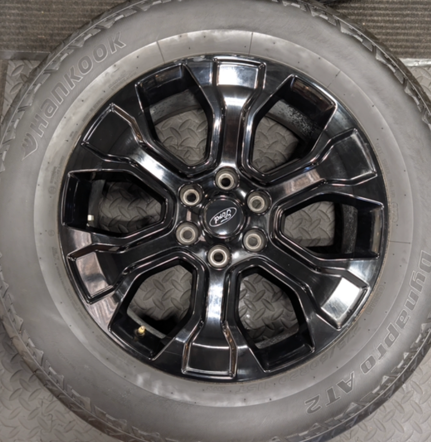 Gloss Black Ford F-150 OEM 20” Wrapped in Hankook Dynapro AT2 275/60R20