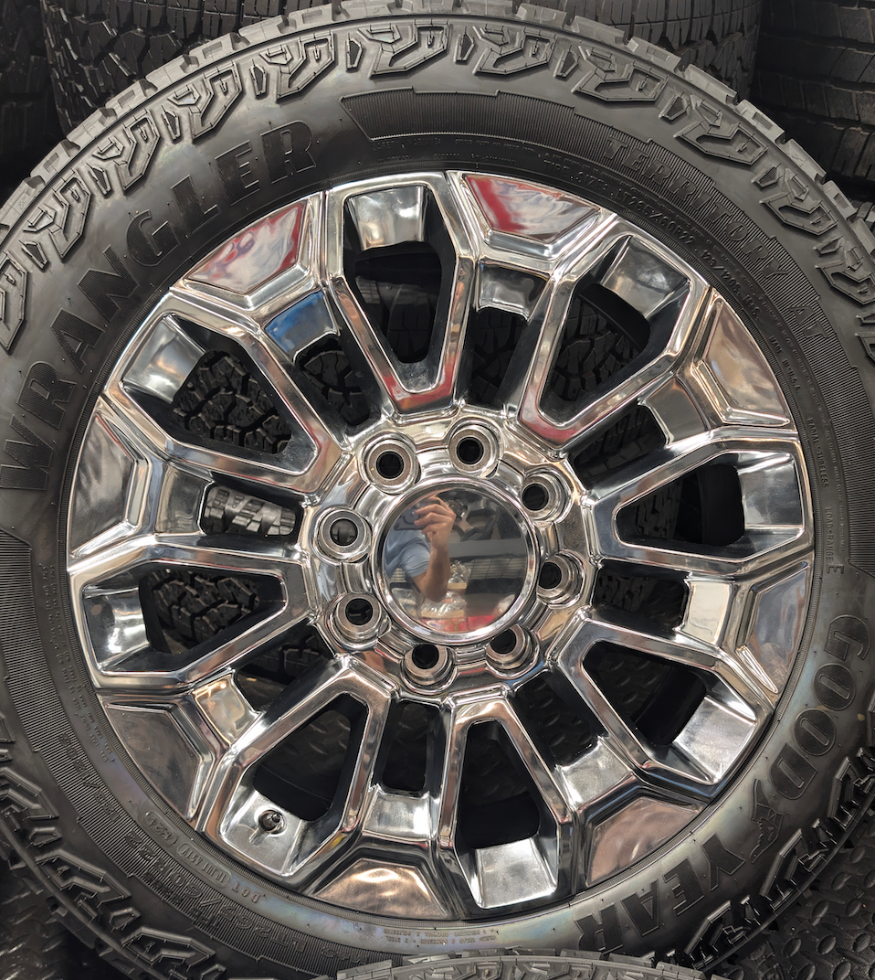 Chrome GM 2500HD / 3500HD OEM 22” Wrapped in Goodyear Wrangler Territory A/T LT265/60R22