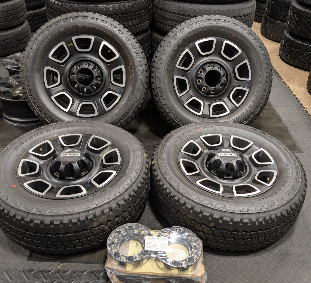 Machined Ford F-250 / F-350 Super Duty Platinum OEM 20” Wrapped in Bridgestone Dueler A/T LT275/65R20