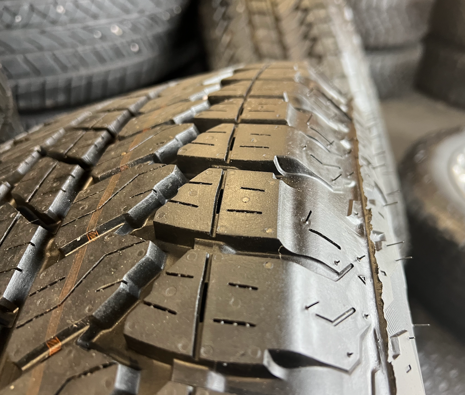 OEM Rebuilt 20” Polished Wheels wrapped in Bridgestone Dueler tires.
