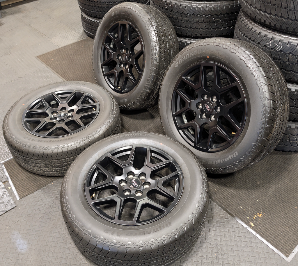 Gloss Black Ford F-150 OEM 20” Wrapped in Hankook Dynapro AT2 275/60R20