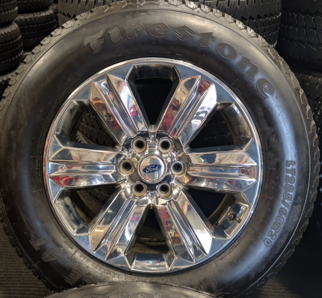 Chrome Ford F-150 OEM 20” Wrapped in Firestone Transforce A/T LT285/60R20