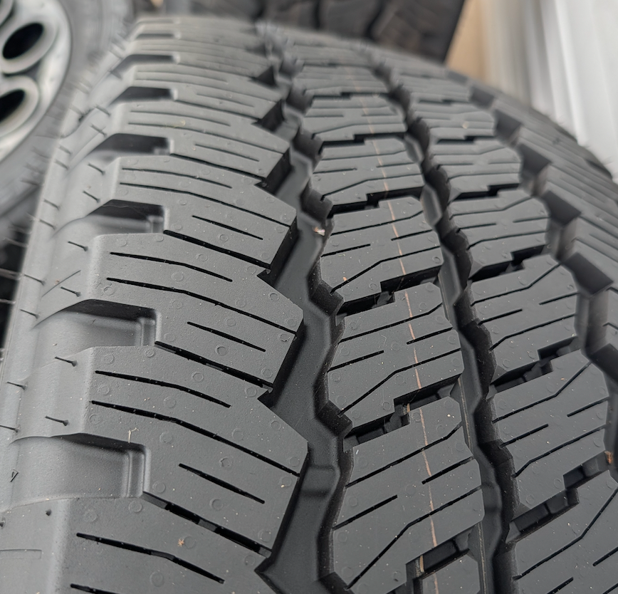Gloss Black Ford F-250 / F-350 Super Duty Tremor OEM 20” Wrapped in Bridgestone Dueler A/T LT275/65R20