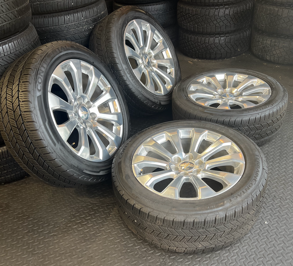 OEM 22”  High Country Polished Aluminum Wheels wrapped in Continental TerrainContact tires.