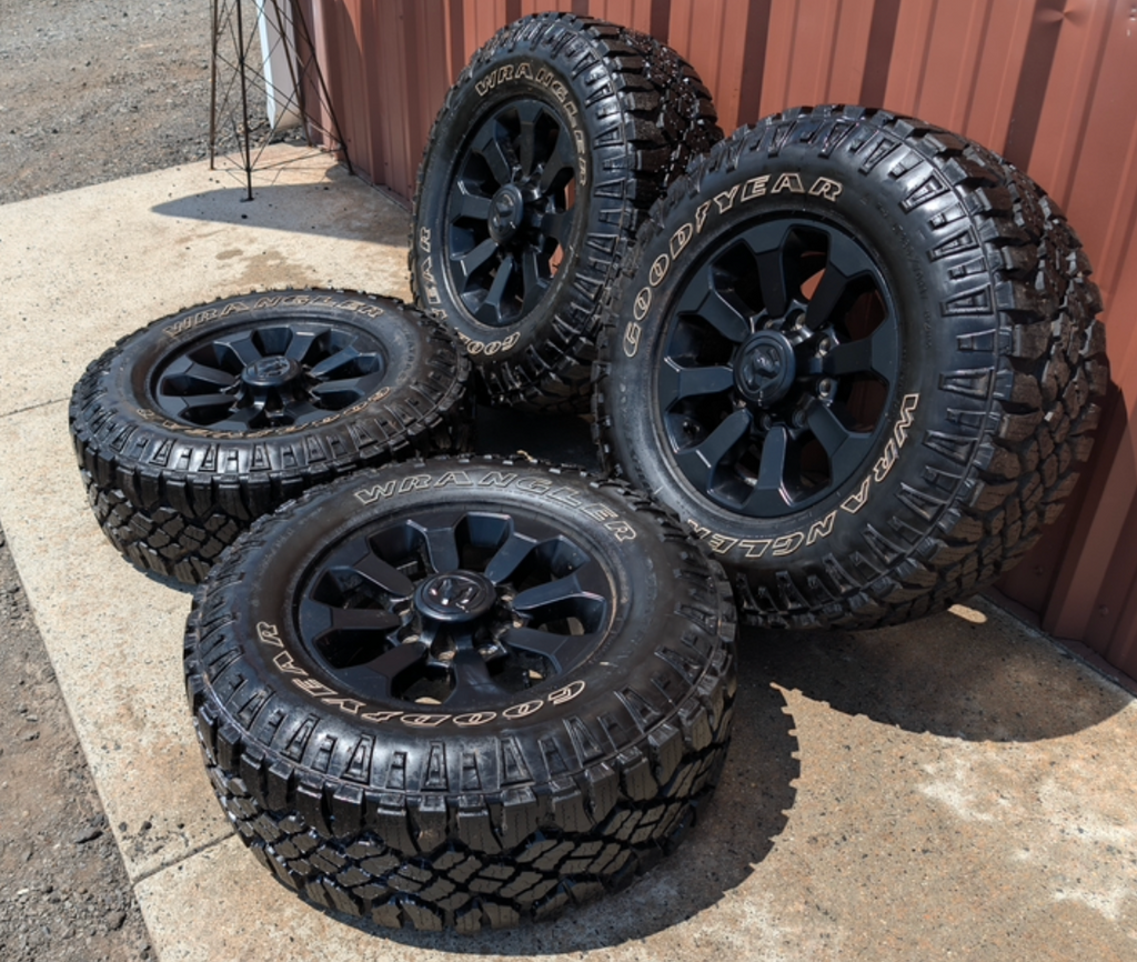 Matte Black Ram 2500 Power Wagon OEM 17” Wrapped in Goodyear Wrangler DuraTrac LT285/70R17