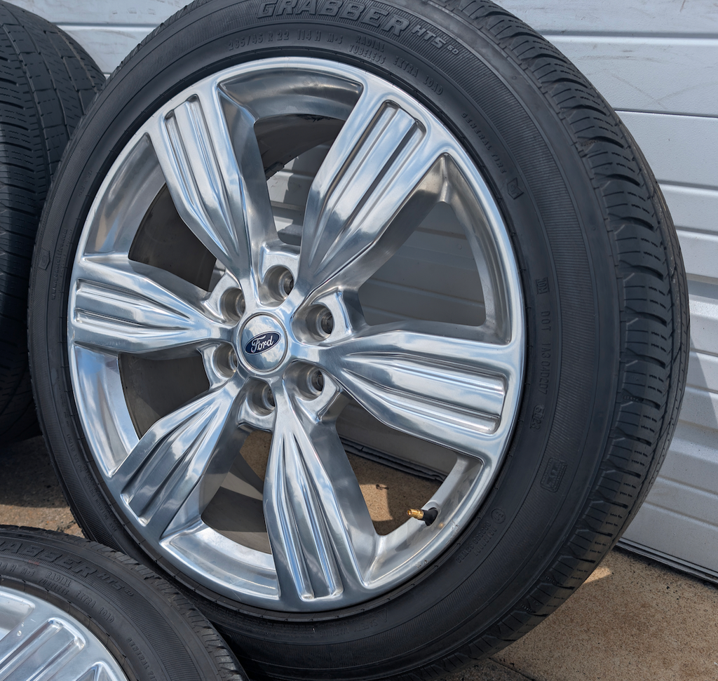 Polished Ford Expedition King Ranch / Limited OEM 22” Wrapped in General Grabber HTS60 285/45R22