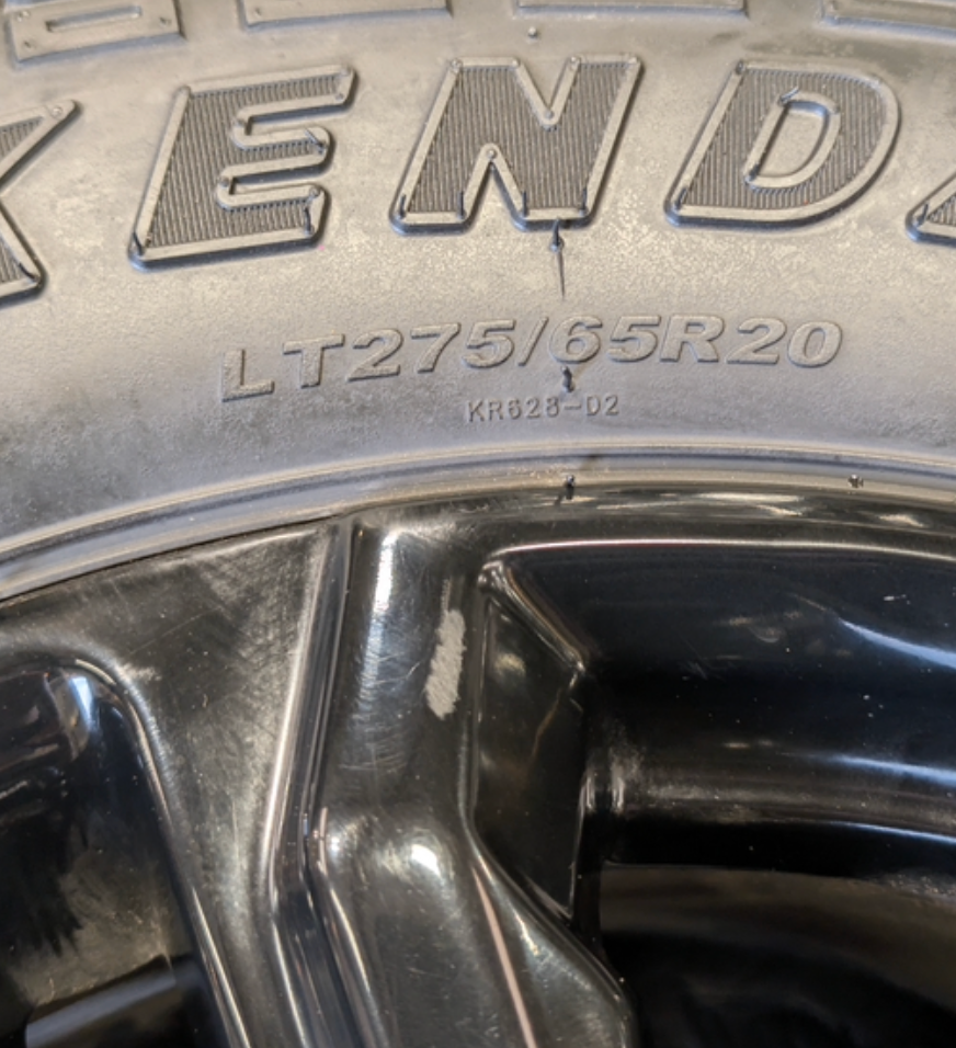 OEM 20” GMC Sierra Denali Black Wheels wrapped in Kenda Klever A/T tires.