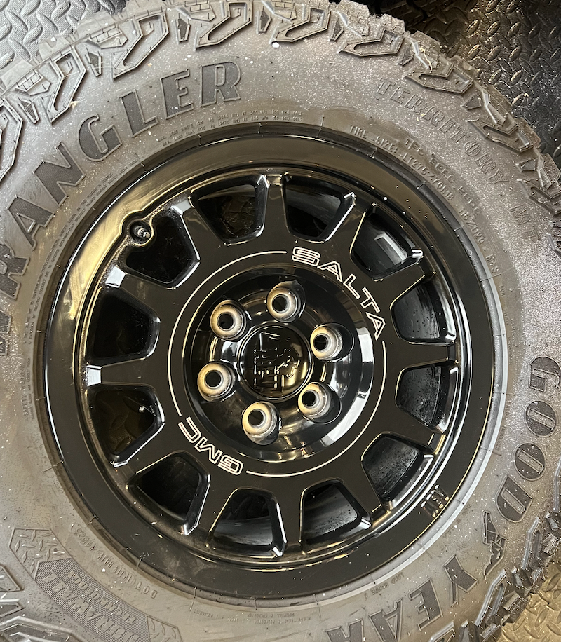 OEM 18” Wheels wrapped in Goodyear Wrangler Territory M/T tires.