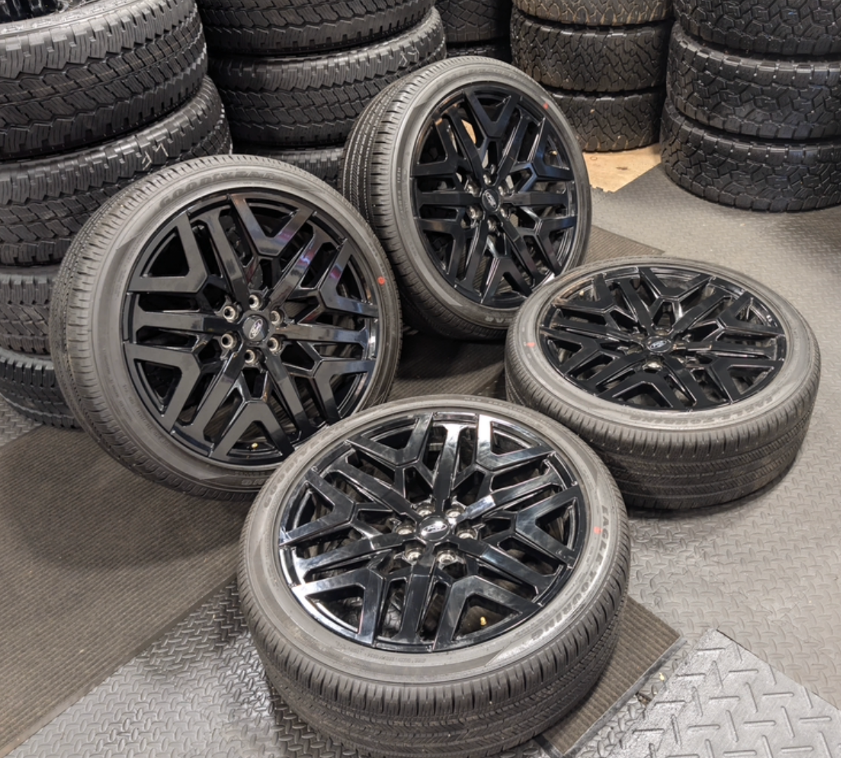 Gloss Black Ford Expedition / F-150 OEM 24” Wrapped in Goodyear Eagle Touring 285/40R24