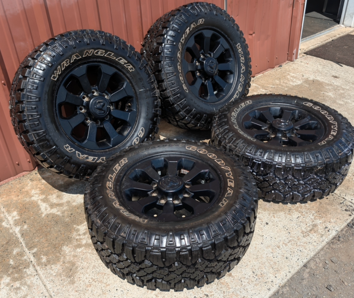 Matte Black Ram 2500 Power Wagon OEM 17” Wrapped in Goodyear Wrangler DuraTrac LT285/70R17