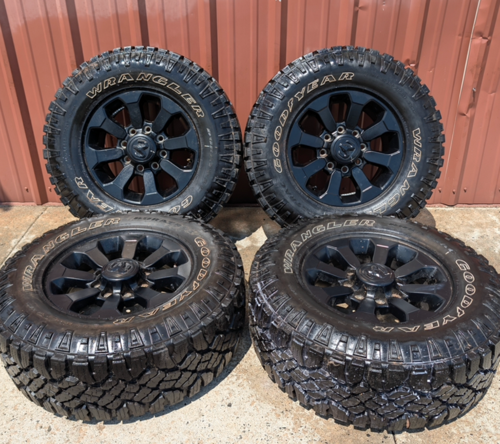 Matte Black Ram 2500 Power Wagon OEM 17” Wrapped in Goodyear Wrangler DuraTrac LT285/70R17