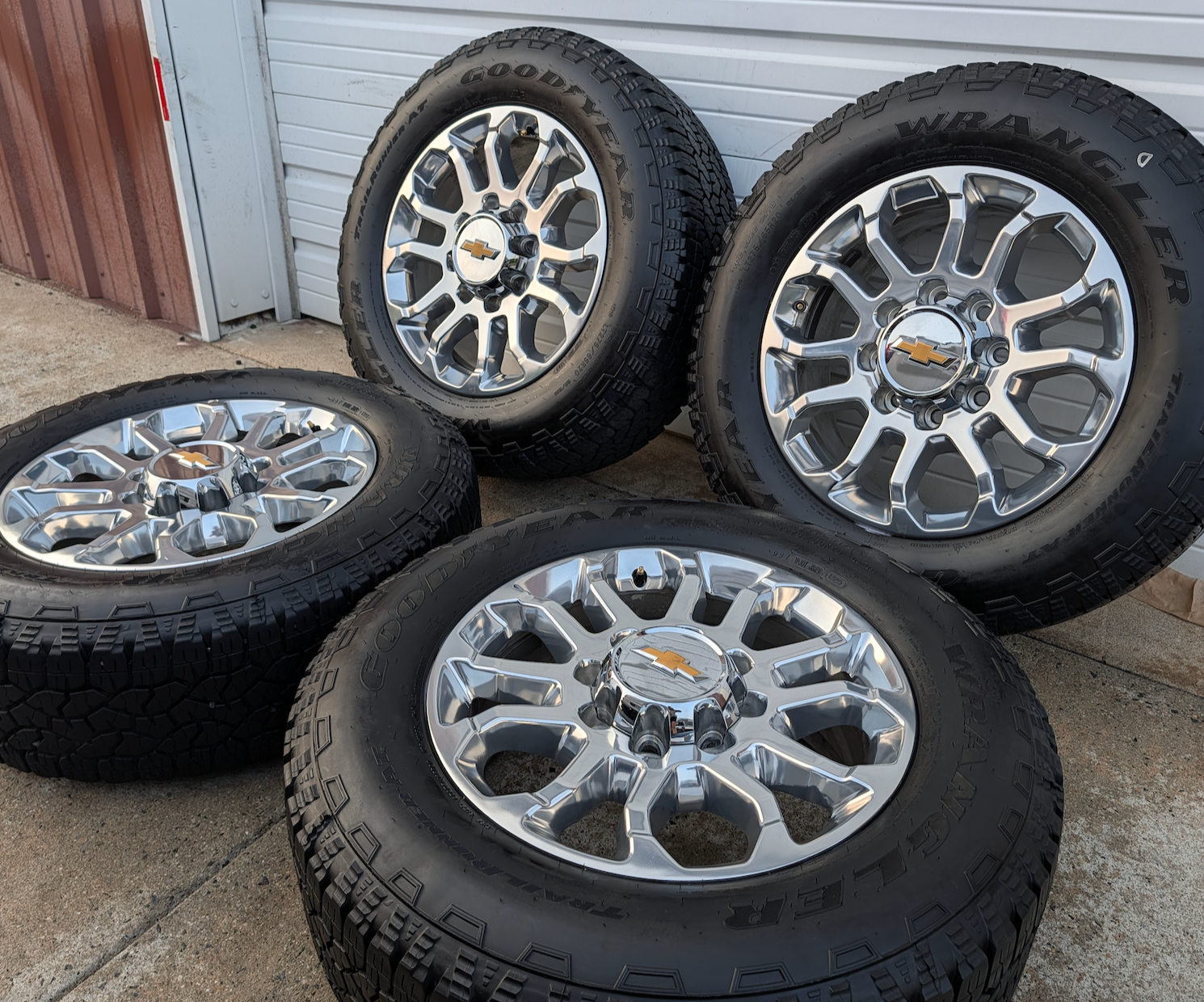 Polished Chevrolet Silverado 2500HD / 3500HD LTZ OEM 20” Wrapped in Goodyear Wrangler TrailRunner A/T LT275/65R20