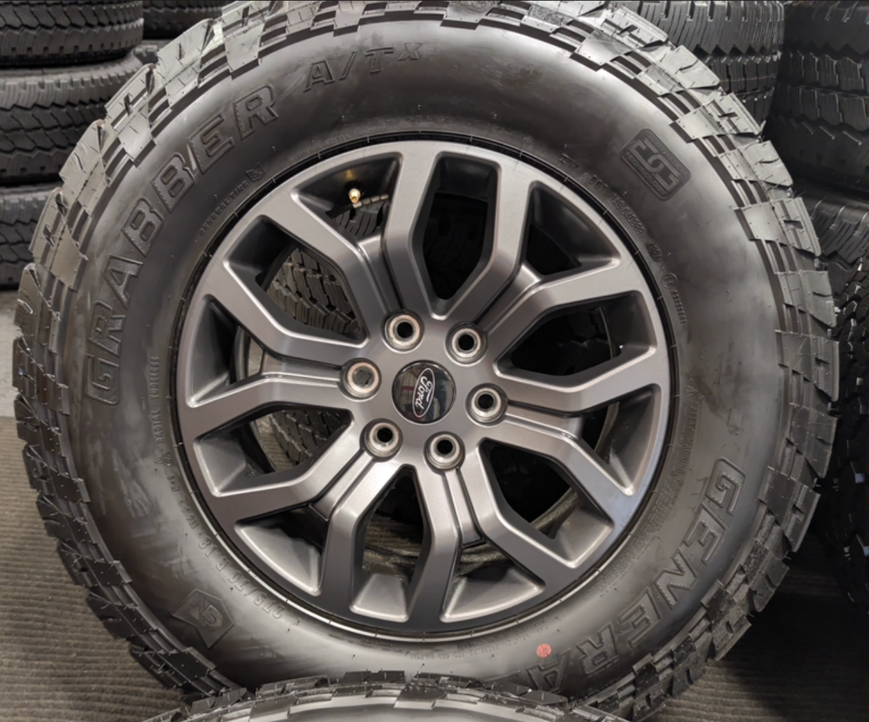 Gray Ford F-150 Tremor OEM 18” Wrapped in General Grabber A/TX 275/70R18