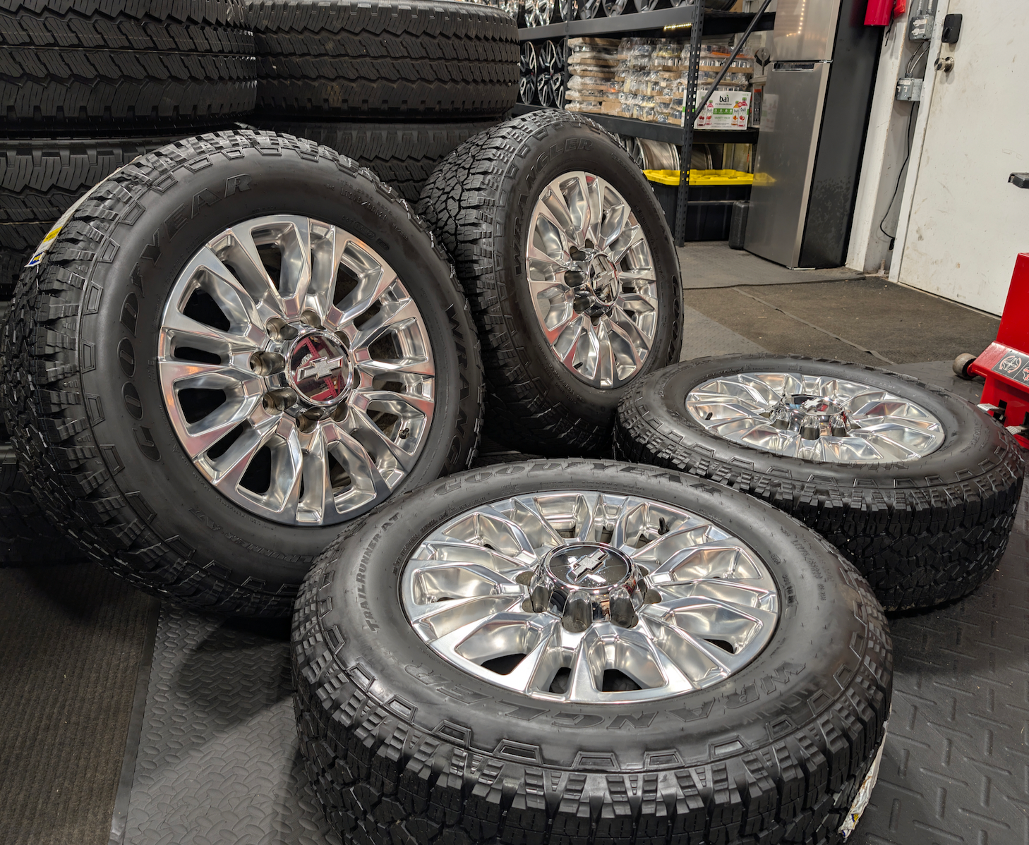 Polished Chevrolet Silverado 2500HD / 3500HD LTZ / High Country OEM 20” Wrapped in Goodyear Wrangler TrailRunner A/T LT275/65R20