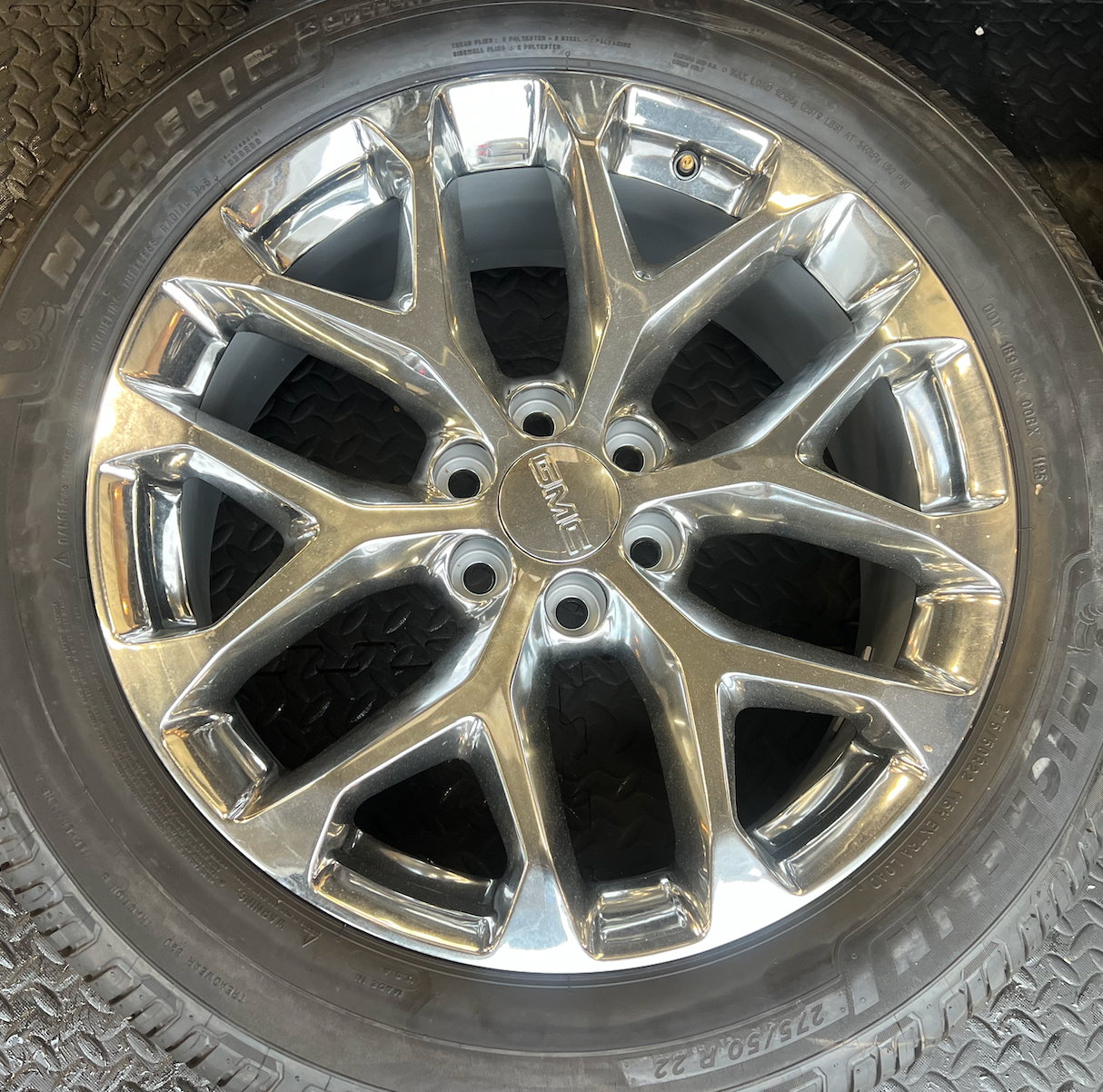 OEM 22” Polished 6-Split-Spoke Wheels wrapped in Bridgestone tires.