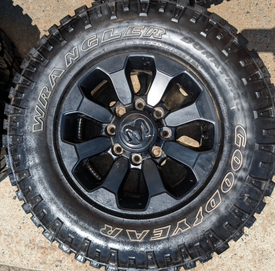 Matte Black Ram 2500 Power Wagon OEM 17” Wrapped in Goodyear Wrangler DuraTrac LT285/70R17