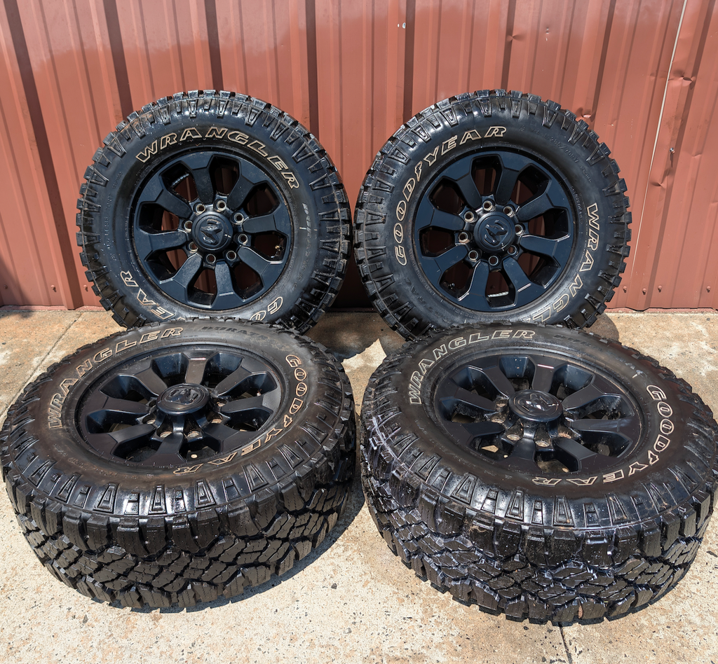 Matte Black Ram 2500 / 3500 Power Wagon OEM 17” Wrapped in Goodyear Wrangler DuraTrac LT285/70R17