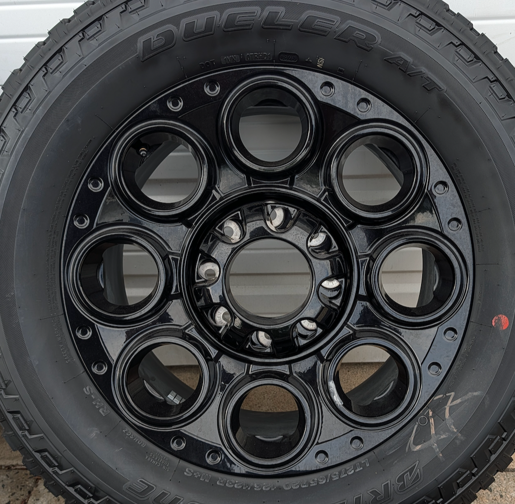 Gloss Black Ford F-250 / F-350 Super Duty Tremor OEM 20” Wrapped in Bridgestone Dueler A/T LT275/65R20