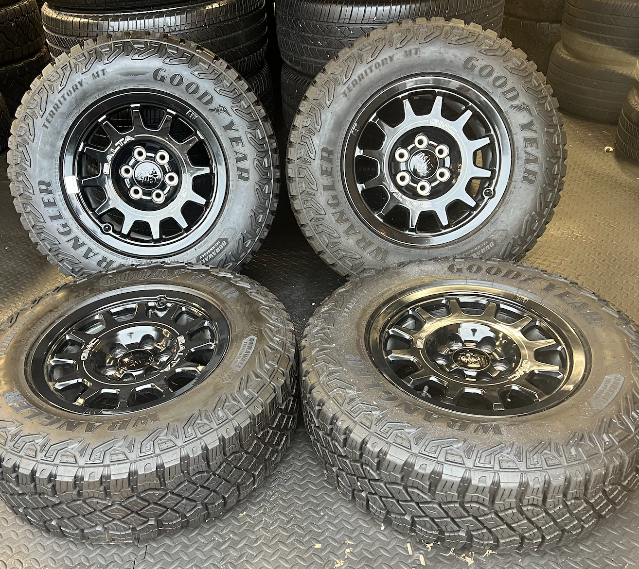 OEM 18” Wheels wrapped in Goodyear Wrangler Territory M/T tires.
