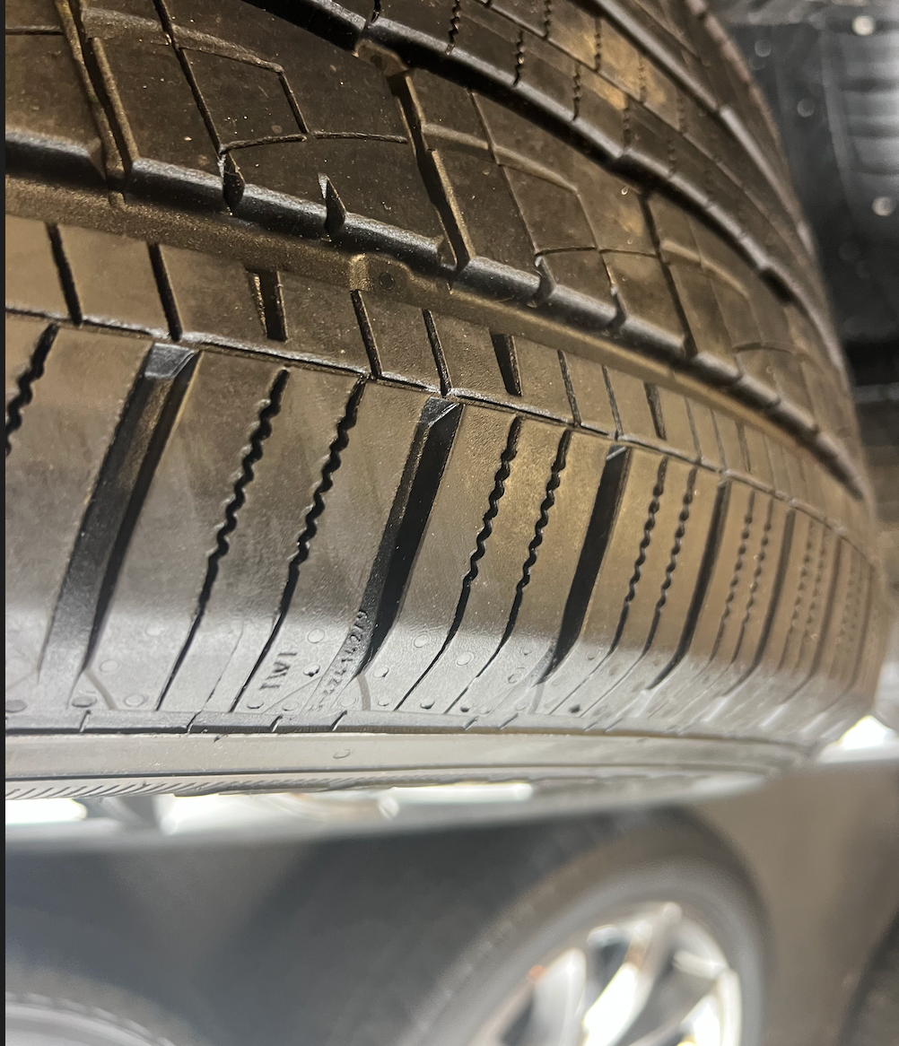 OEM 22” Wheels with Hypersilver Finish & Chrome Inserts wrapped in General Grabber tires.