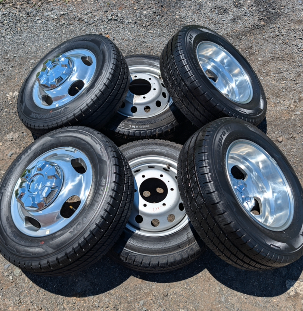 OEM 16” Polished Ford Transit Dual Rear Wheel (Dually) Wheels wrapped in 205/75R16 Hankook Dynapro HT tires.