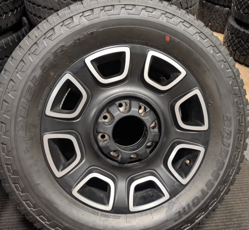 Machined Ford F-250 / F-350 Super Duty Platinum OEM 20” Wrapped in Bridgestone Dueler A/T LT275/65R20