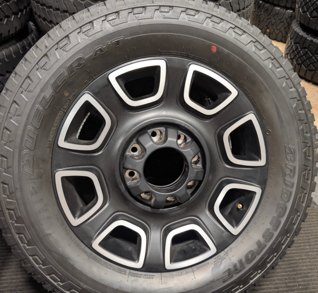 Machined Ford F-250 / F-350 Super Duty Platinum OEM 20” Wrapped in Bridgestone Dueler A/T LT275/65R20