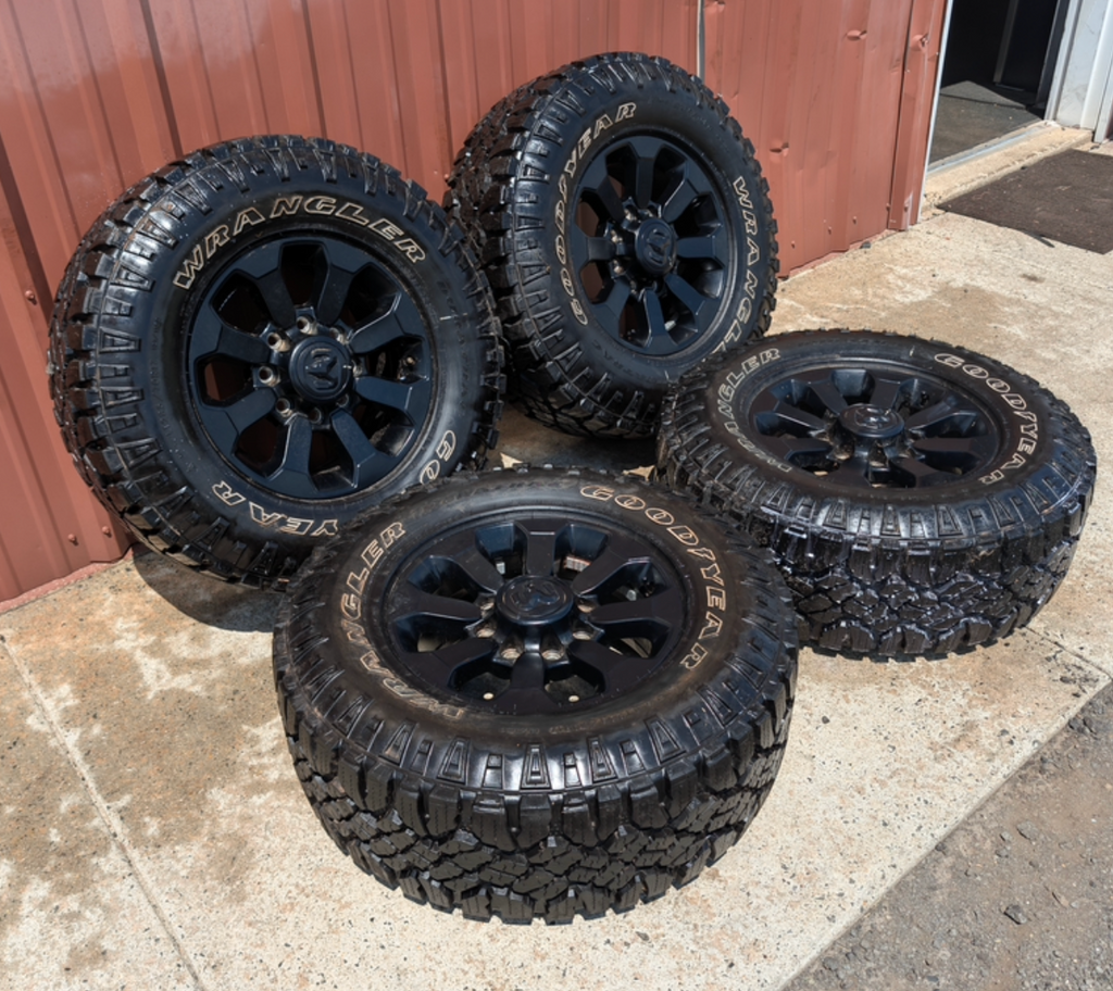 Matte Black Ram 2500 / 3500 Power Wagon OEM 17” Wrapped in Goodyear Wrangler DuraTrac LT285/70R17