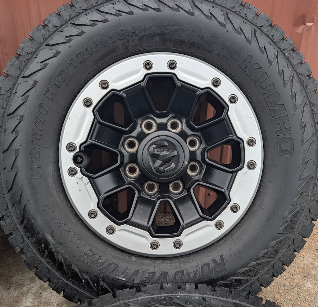 Machined Ram 2500 / 3500 Power Wagon OEM 17” Wrapped in Kumho Road Venture AT52 LT285/70R17