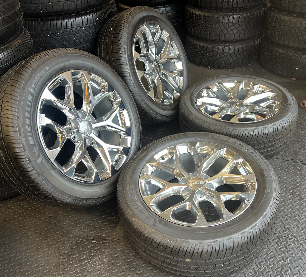 OEM 22” Polished 6-Split-Spoke Wheels wrapped in Bridgestone tires.