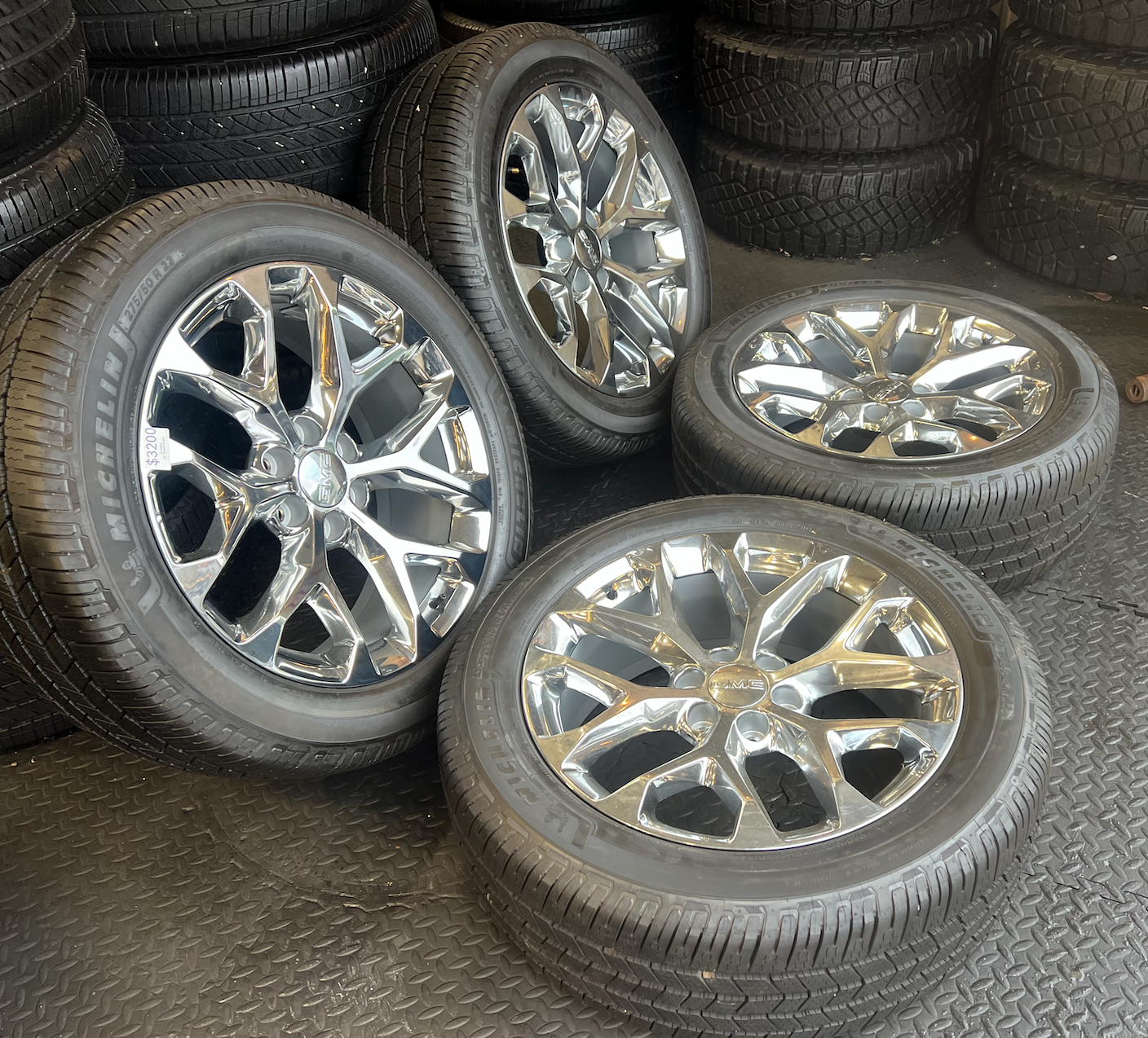 OEM 22” Polished 6-Split-Spoke Wheels wrapped in Bridgestone tires.