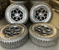OEM 18”  Wheels wrapped in Goodyear Wrangler Territory M/T tires.