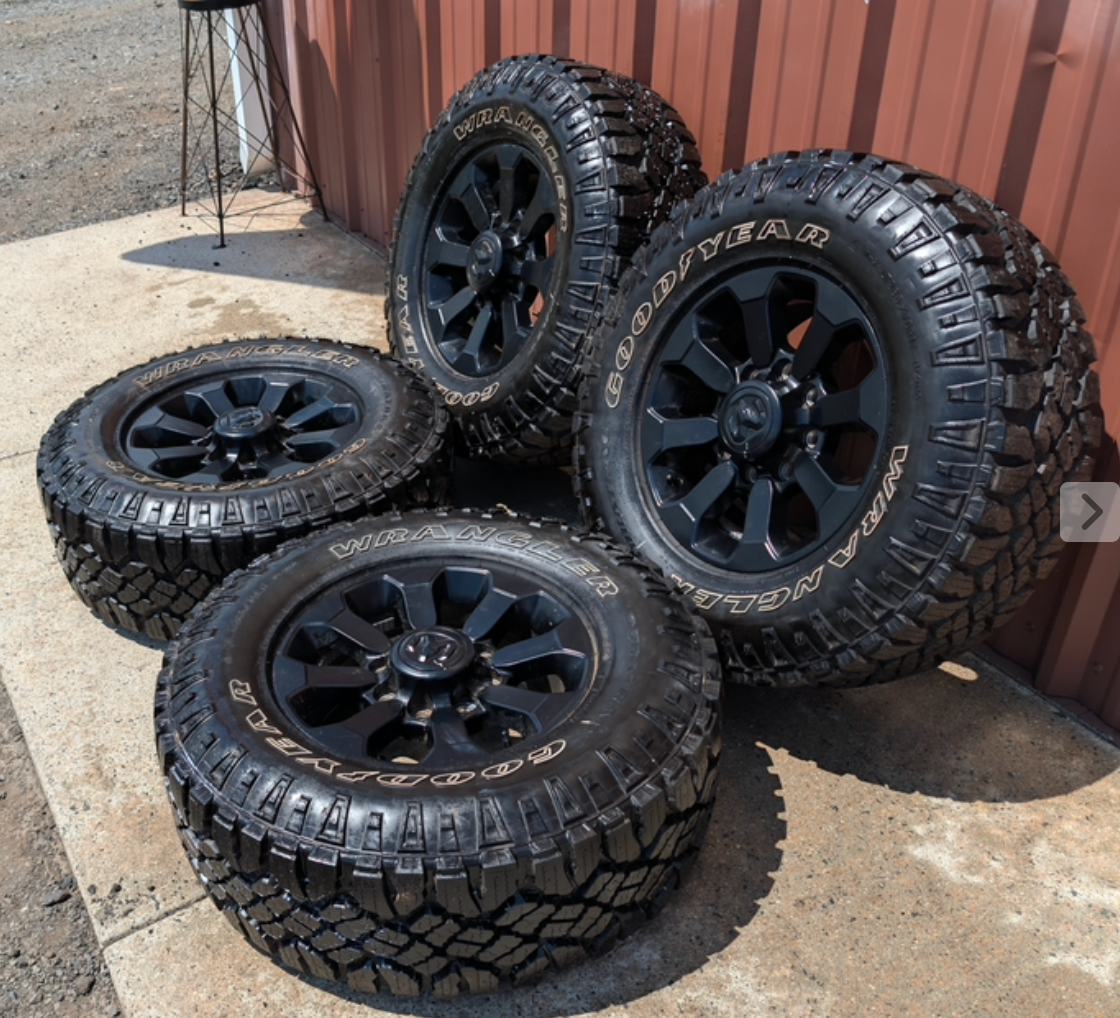 Matte Black Ram 2500 / 3500 Power Wagon OEM 17” Wrapped in Goodyear Wrangler DuraTrac LT285/70R17