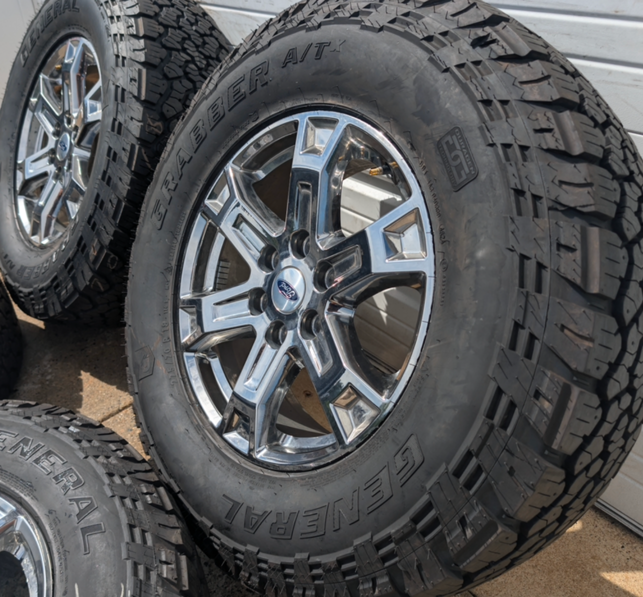 Chrome Ford F-150 XLT OEM 18” Wrapped in General Grabber A/T 275/70R18