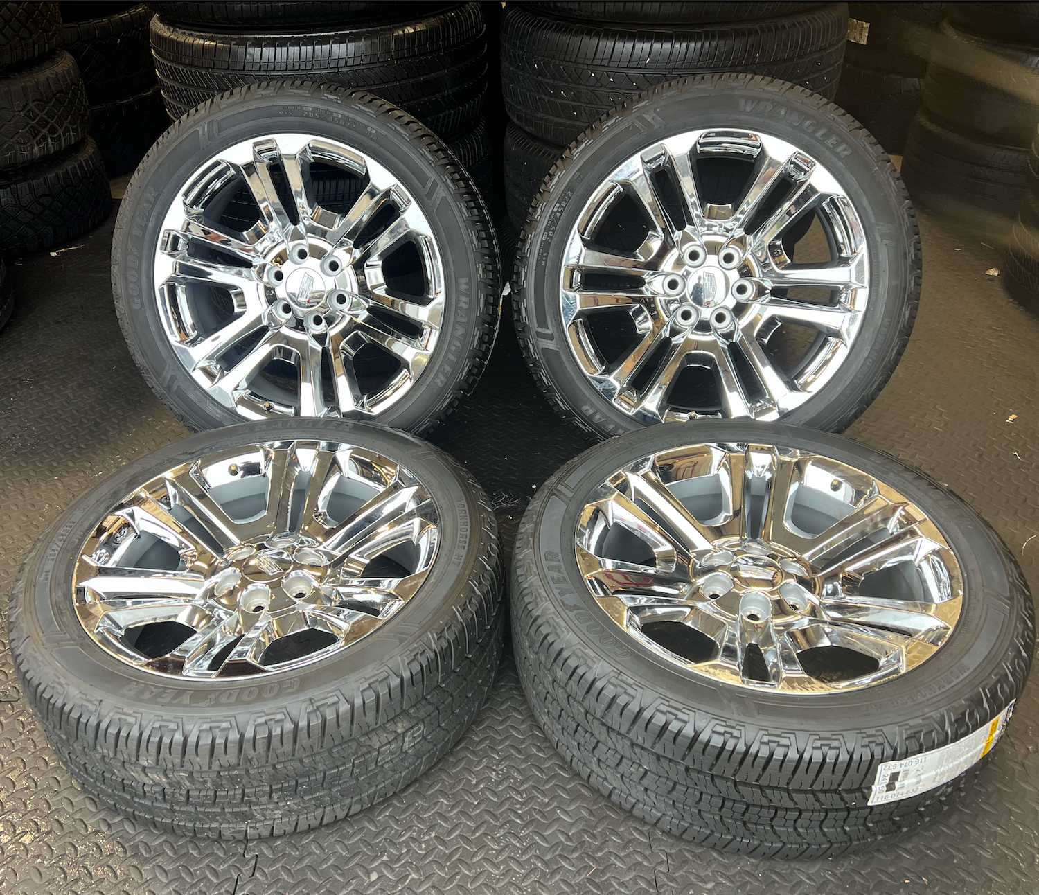 OEM 22” Split 6 Chrome  Wheels wrapped in Goodyear Wrangler Workhorse HT tires.